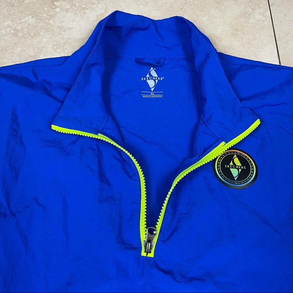 Skechers blue windbreaker